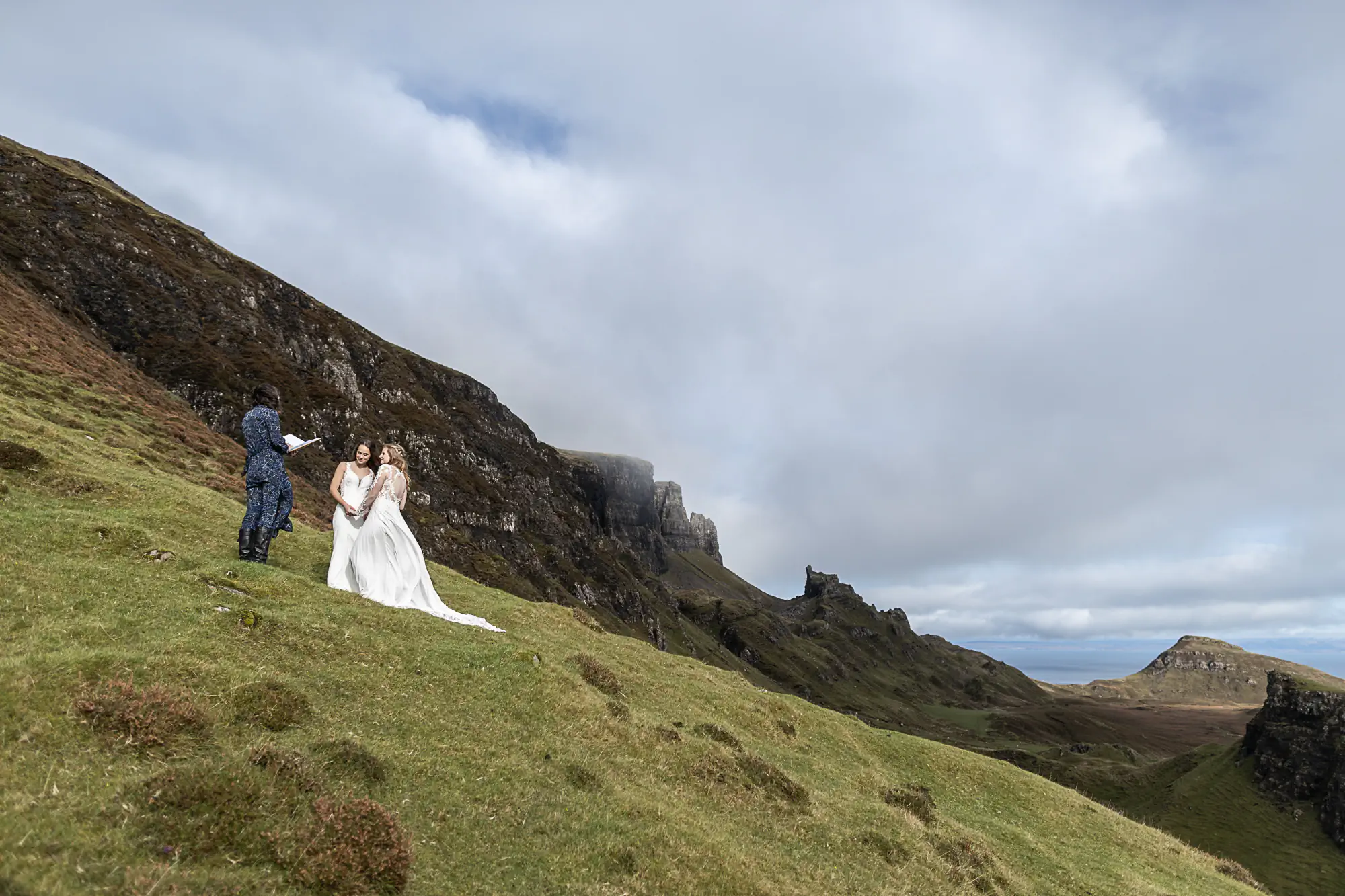 outdoor ceremony with crags in background