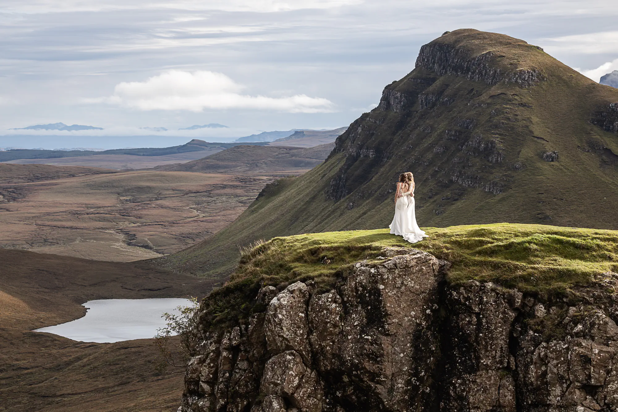 newlywed girls with a dramatic view