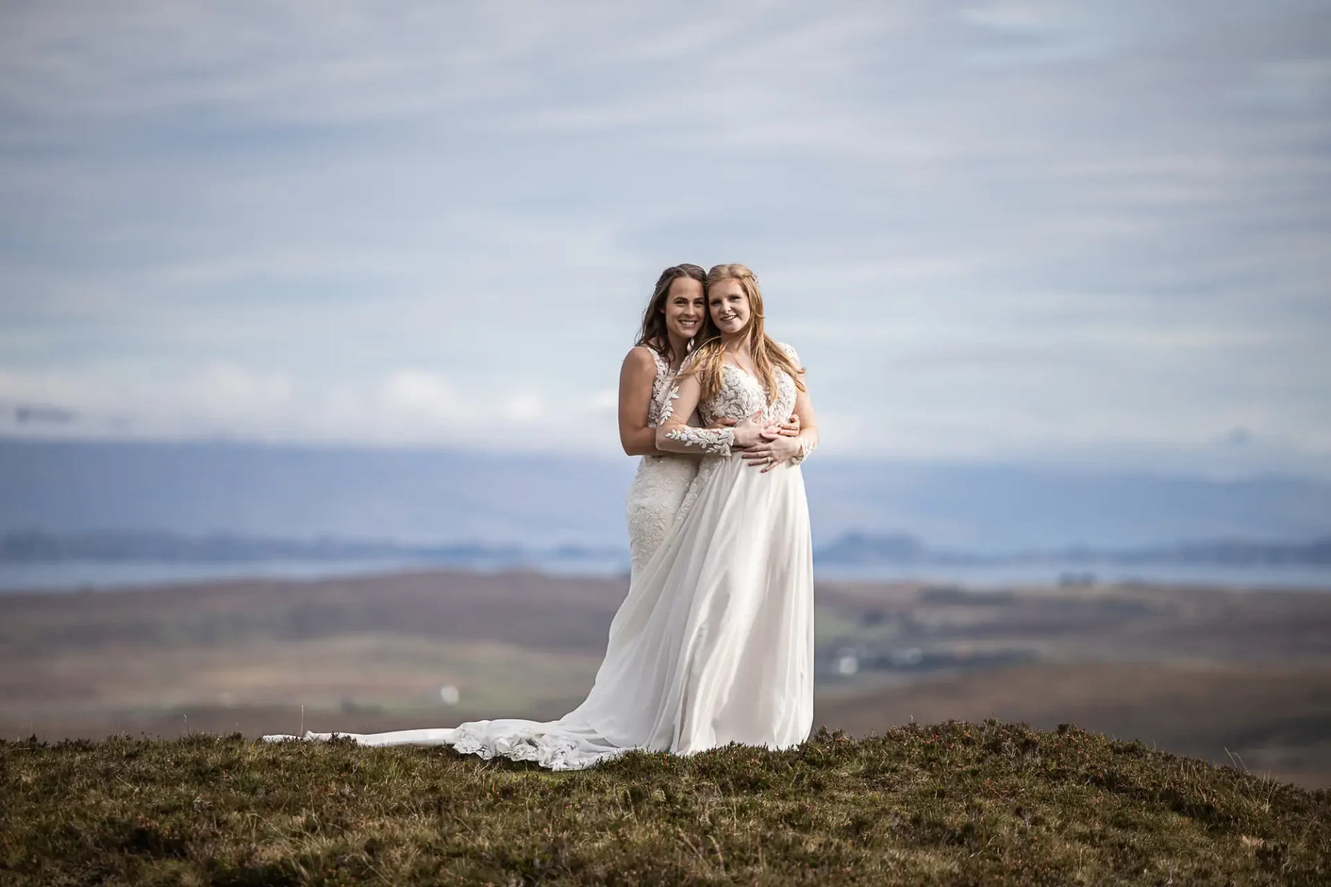 Adrienne and Emily hold each other