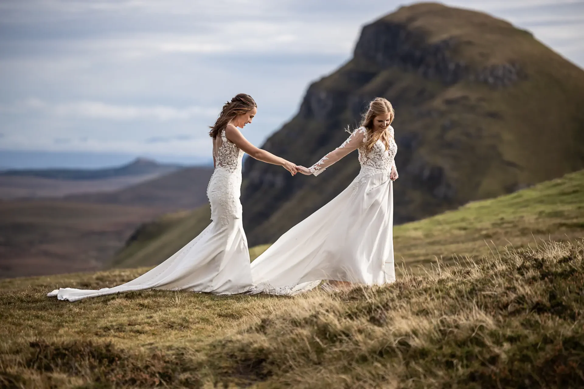 Adrienne and Emily walking holding hands