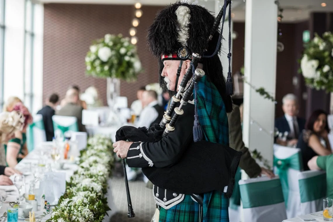 piper toasts bride and groom at top table
