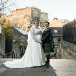 bride and groom photographed at The Vennel with Edinburgh Castle in the distance