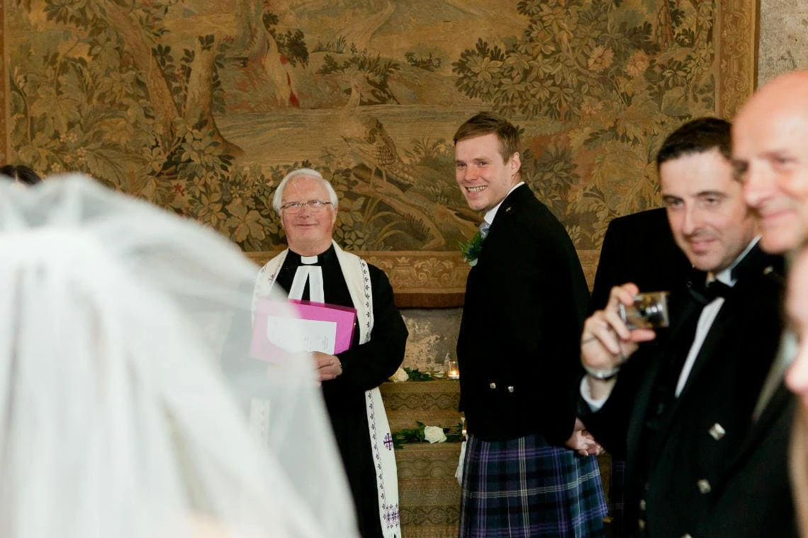 Auld Keep Great Hall processional groom first look at bride