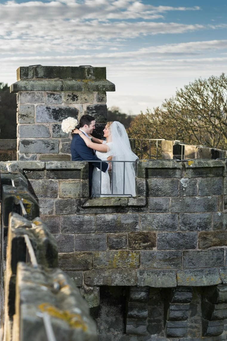 Auld Keep rooftop newlyweds embrace long shot