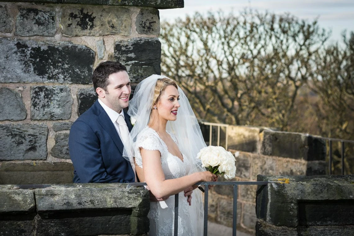 Auld Keep rooftop newlyweds looking out across gardens