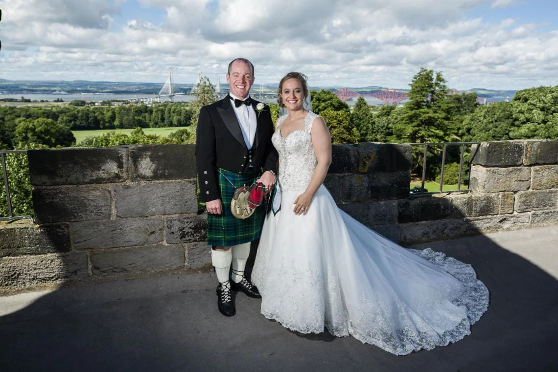 Auld Keep rooftop newlyweds with Forth Bridges in the background
