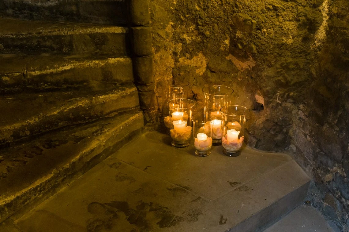 Auld Keep staircase landing candles