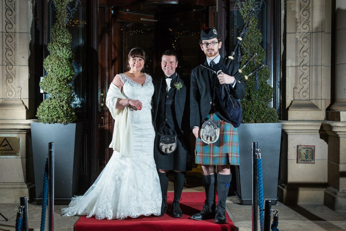 Red Carpet Entrance - newlyweds with the piper