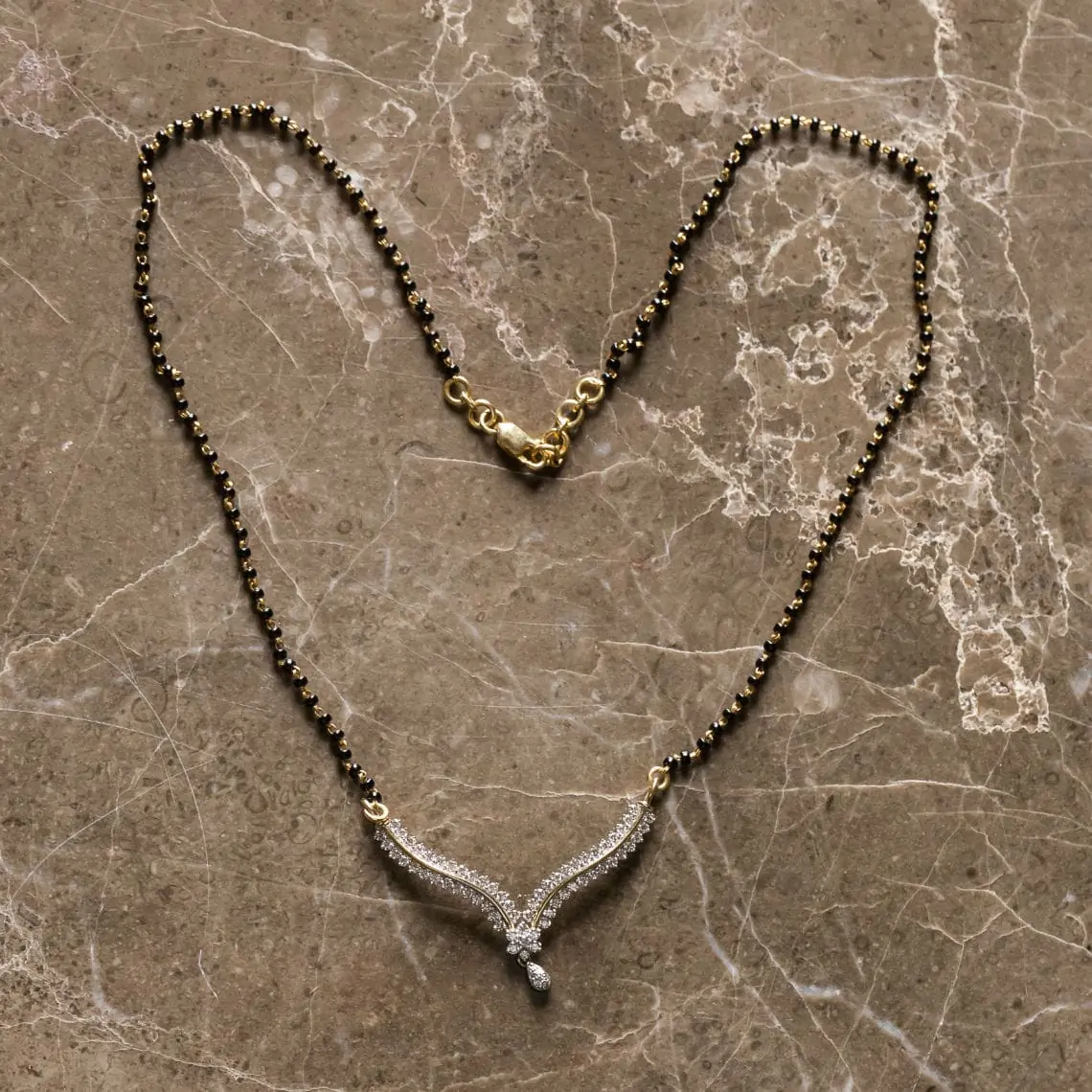 necklace laid out in the shape of a heart