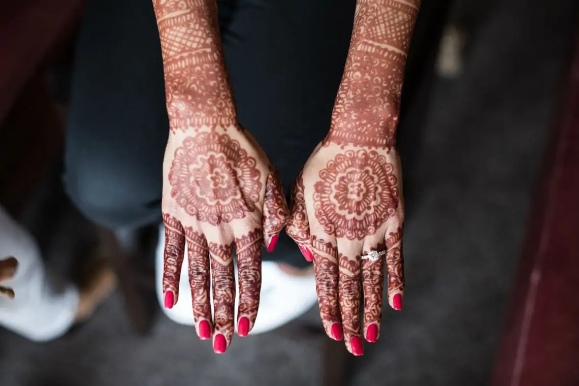 Bride's hands with henna tattoo