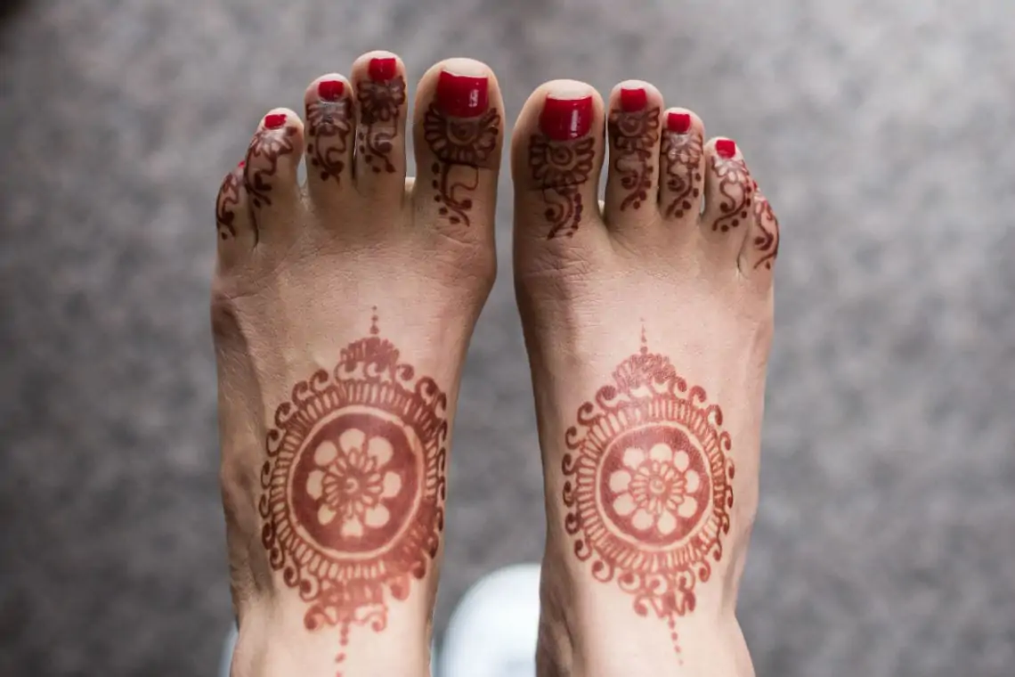 Bride's feet showing henna tattoo