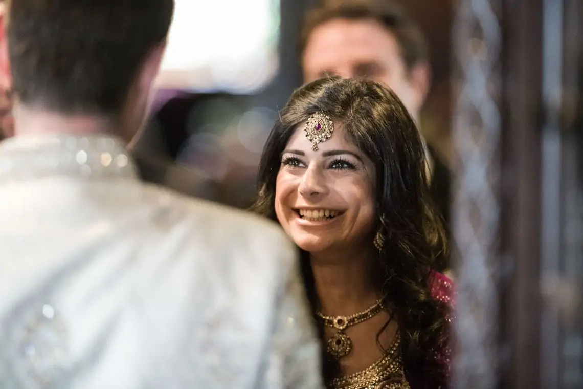 Lady smiling at the Groom