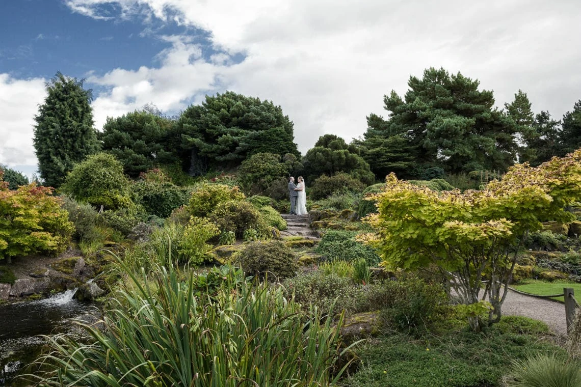 Botanic Gardens newlyweds by the waterfall