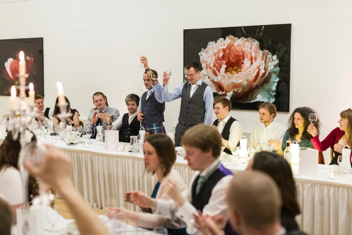 Caledonian Hall grooms raise a toast