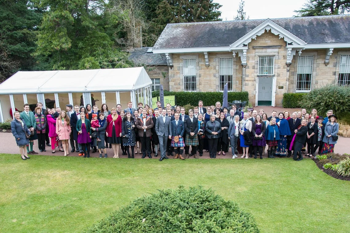 Caledonian Hall group photo of everyone on the lawn