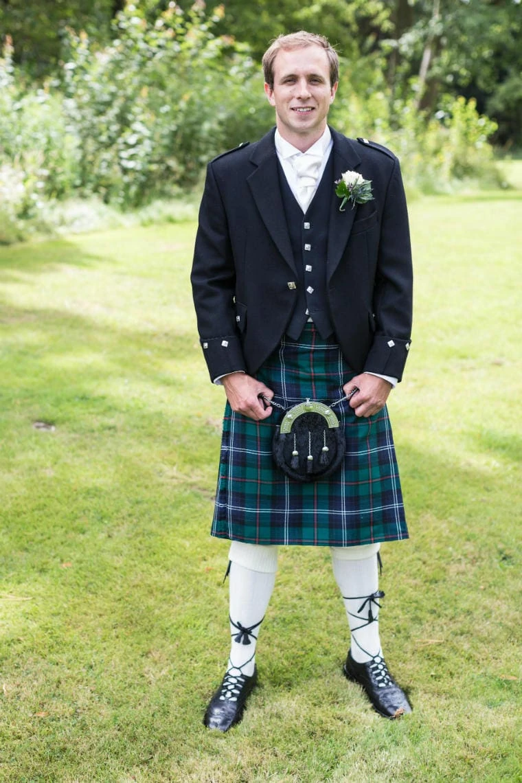 groom Jamie wearing Highland kilt outfit