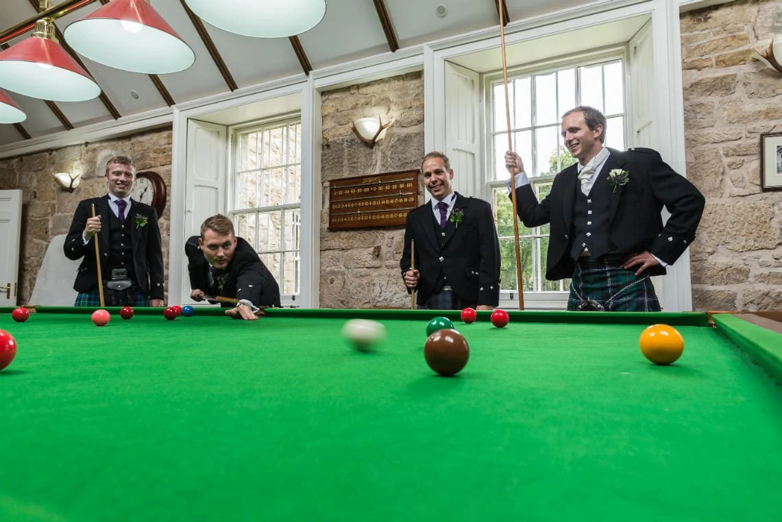 groom and groomsmen in the Snooker Room