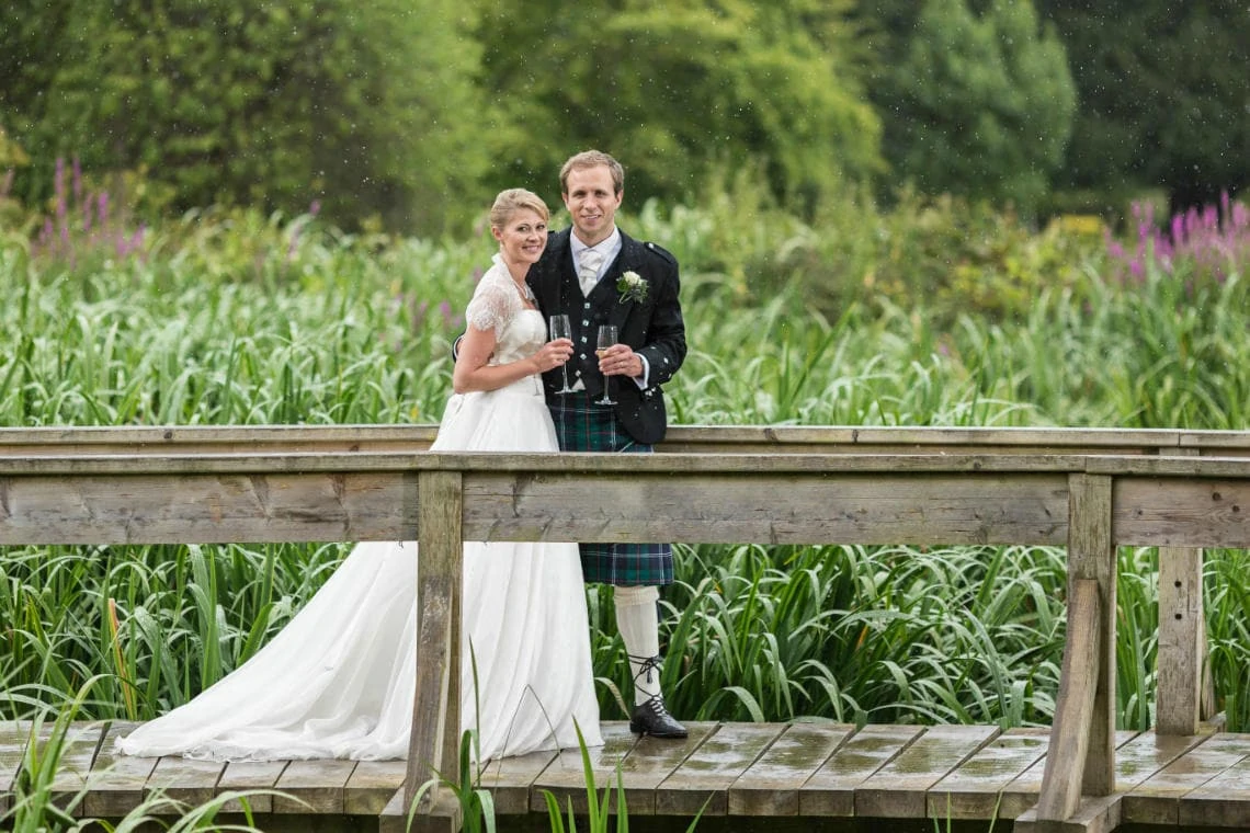 newlyweds in the grounds of Carberry Tower