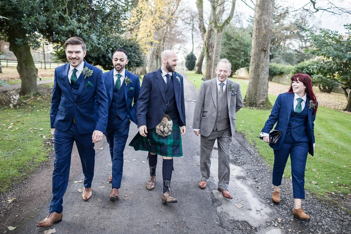 groom and best men walking to the ceremony
