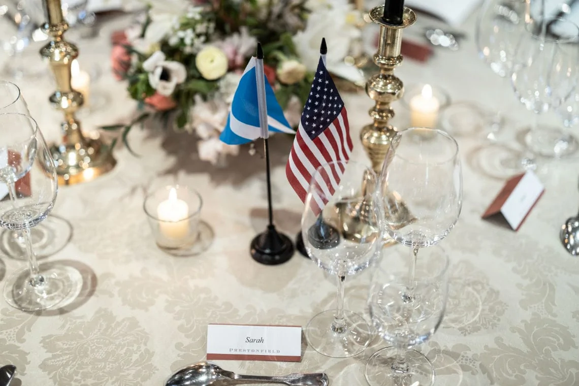 mini Scottish and American flags on the top table