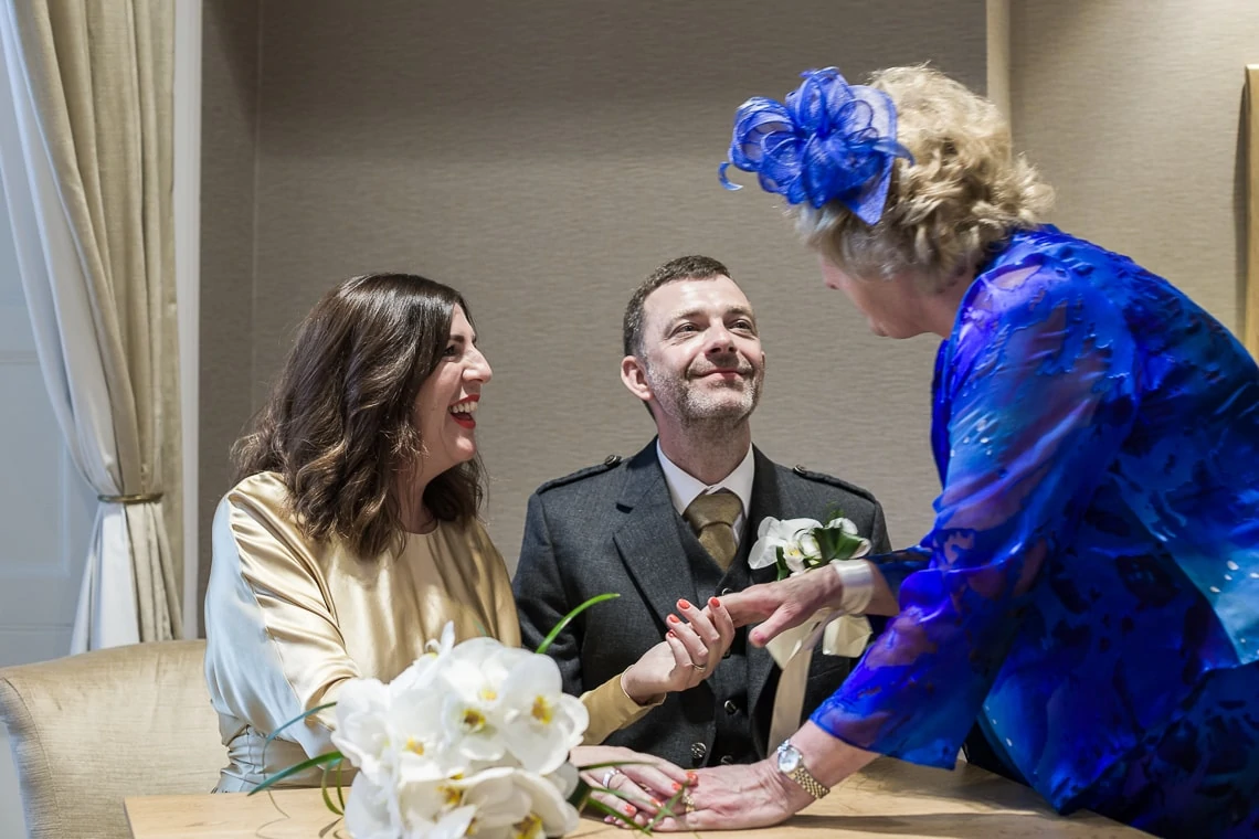 newlyweds congratulated by mother of the groom