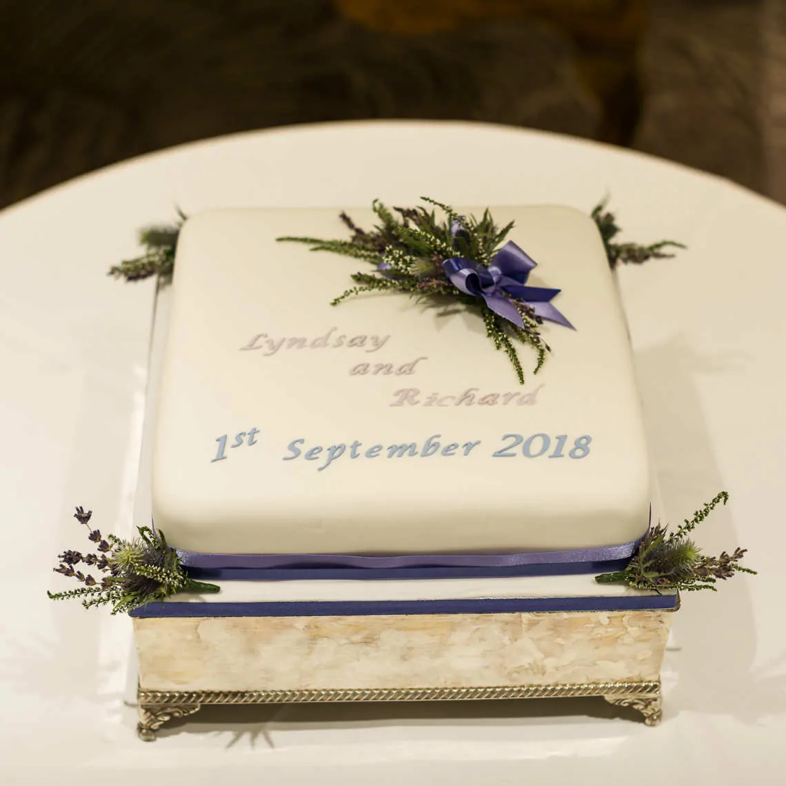 Wedding cake on silver cake stand