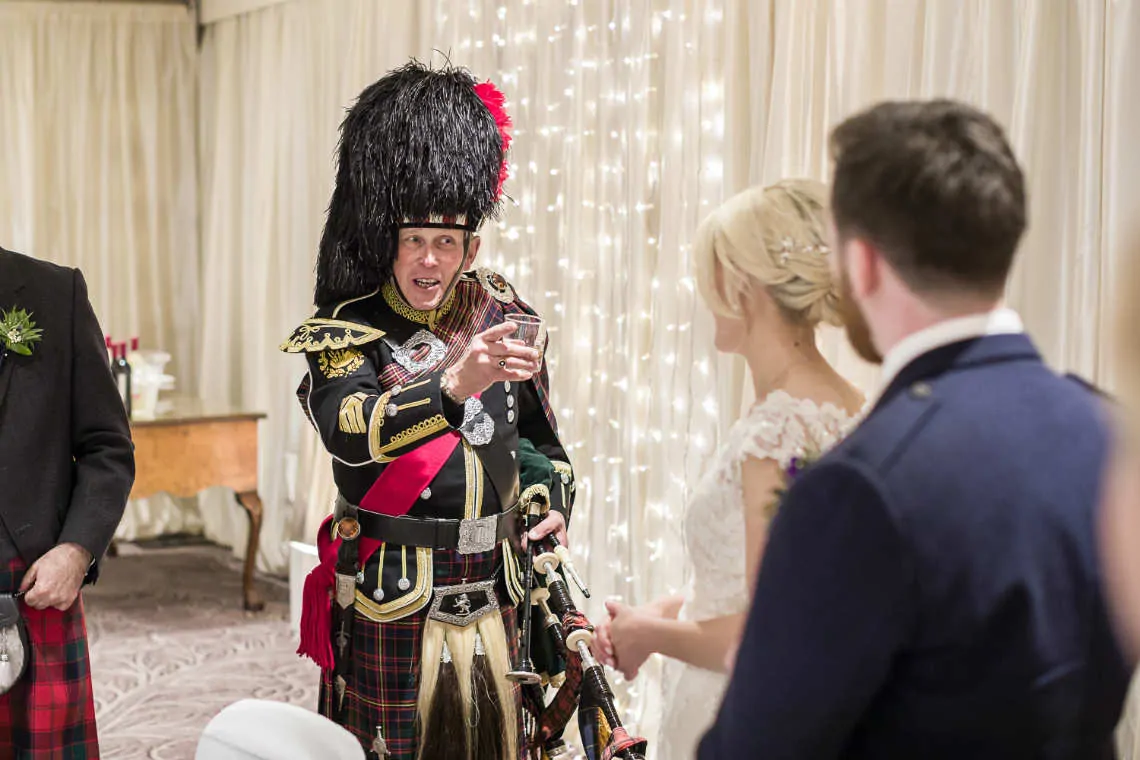 Piper toasts newlyweds at the top table