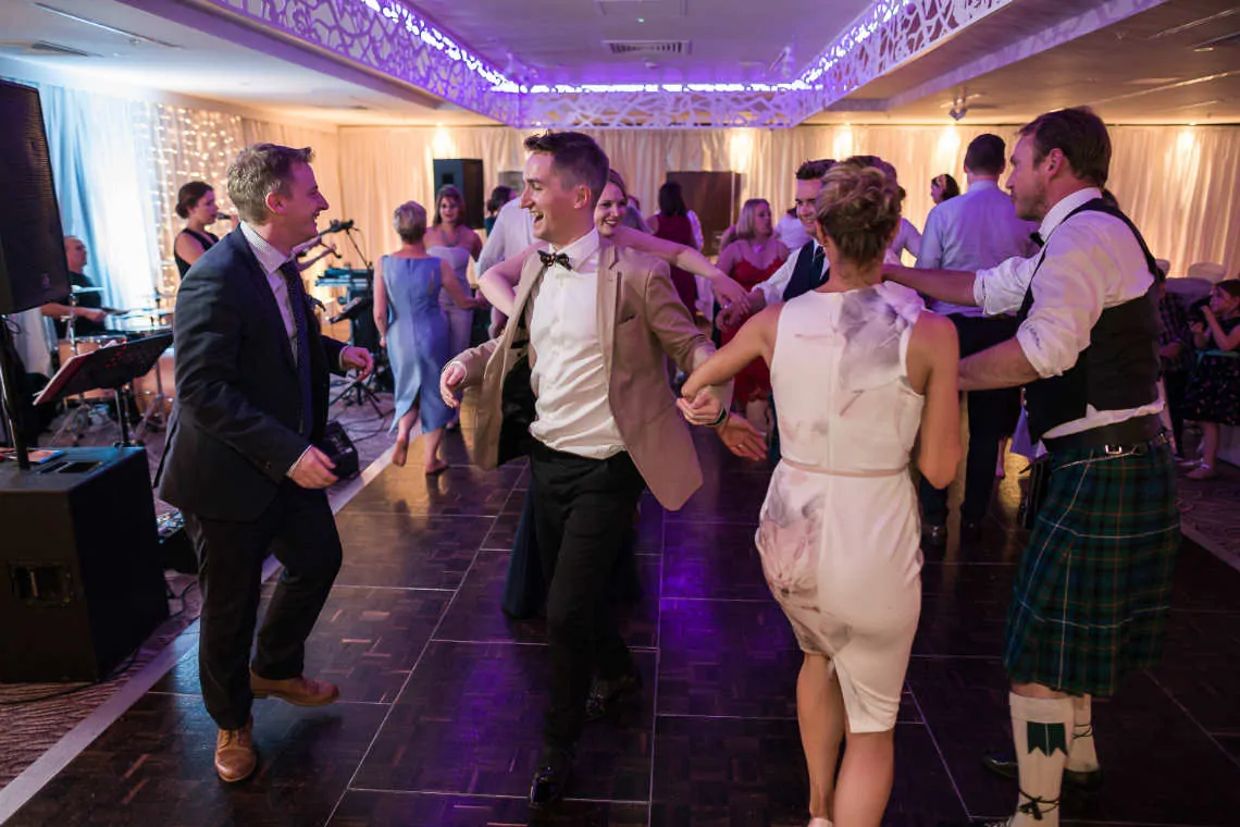 Guests dancing at evening reception