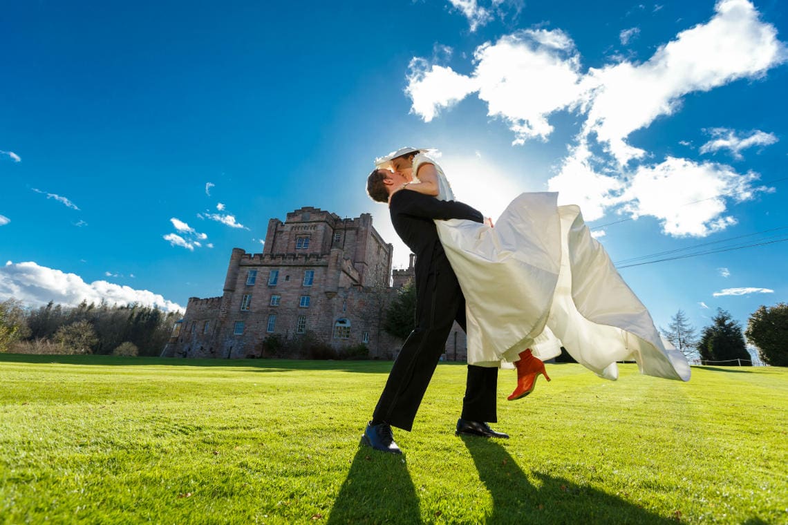 Dalhousie Castle photos of newlywed Helen and Bram’s Belgian American celebration