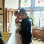 newlyweds' first kiss in the chapel