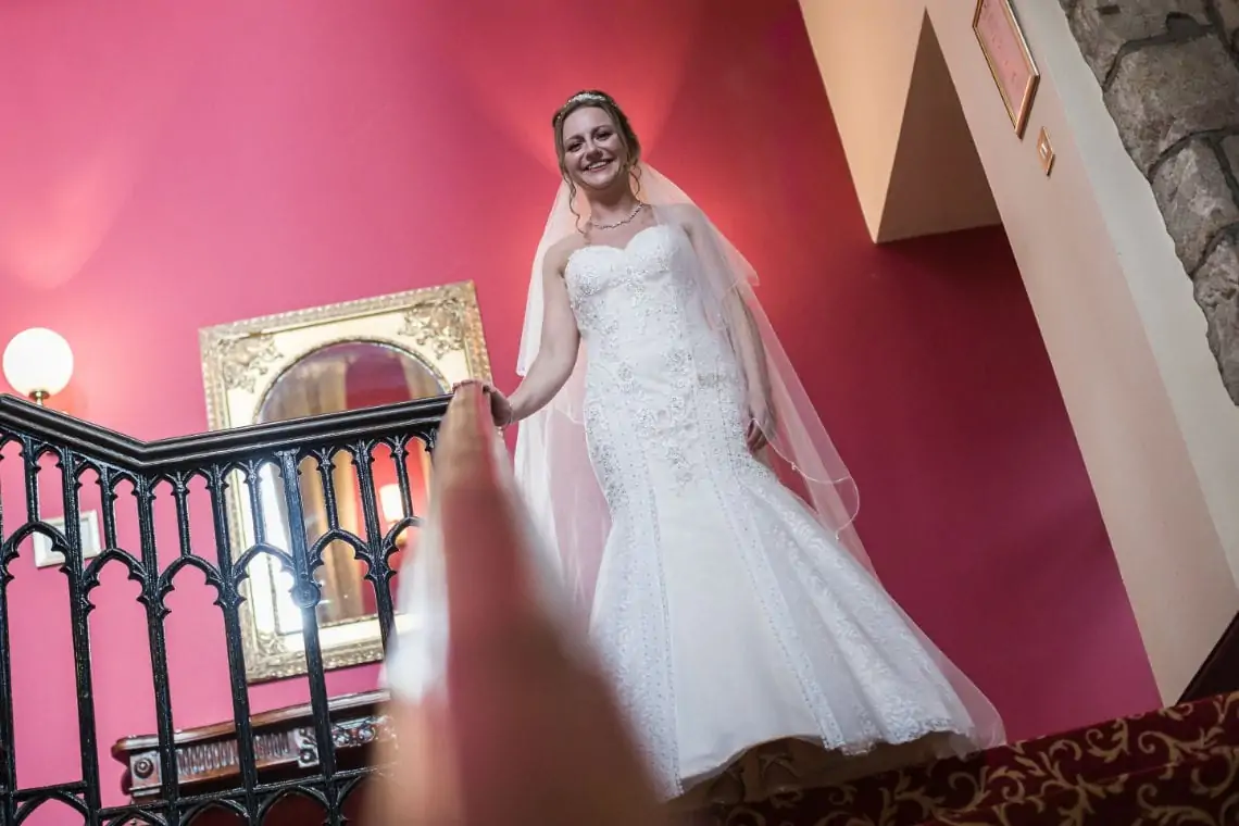 Bride on stairs.