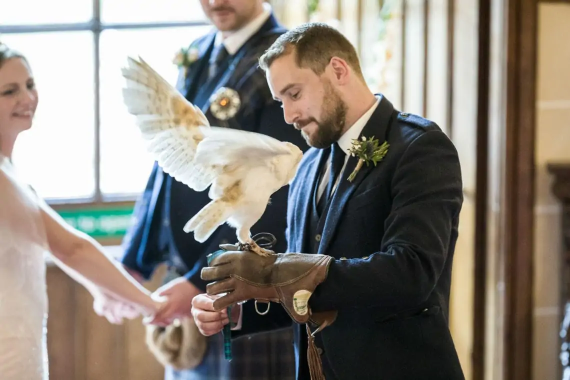 Best man and owl at ceremony.