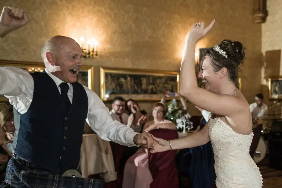 Bride and Dad dancing in The Sir Alexander Room.
