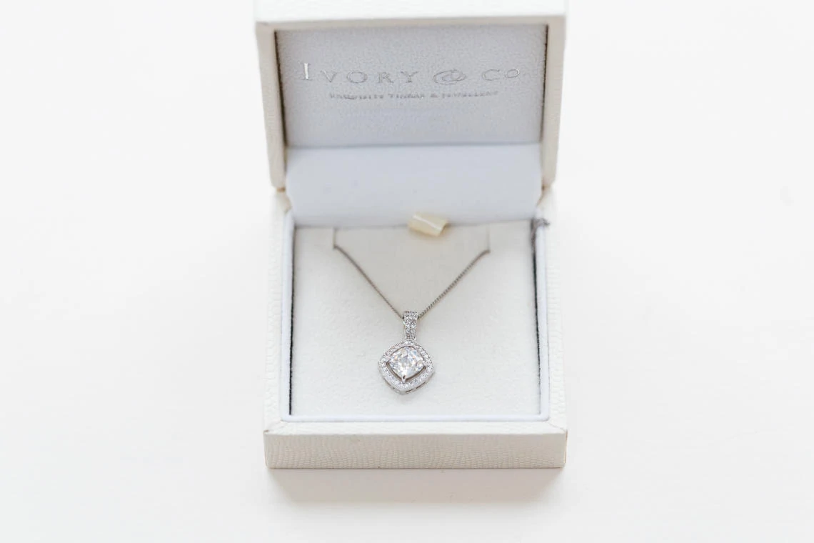 bride's Ivory and Co diamond necklace in a white box