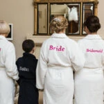 bridal squad wearing wedding bath gowns in the WInter Room