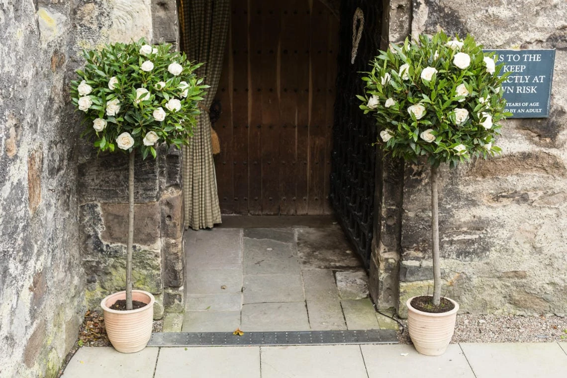 flowers at the entrance to the Auld Keep