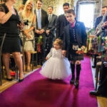 processional into the Auld Keep as flower girl is escorted by page boy up the aisle