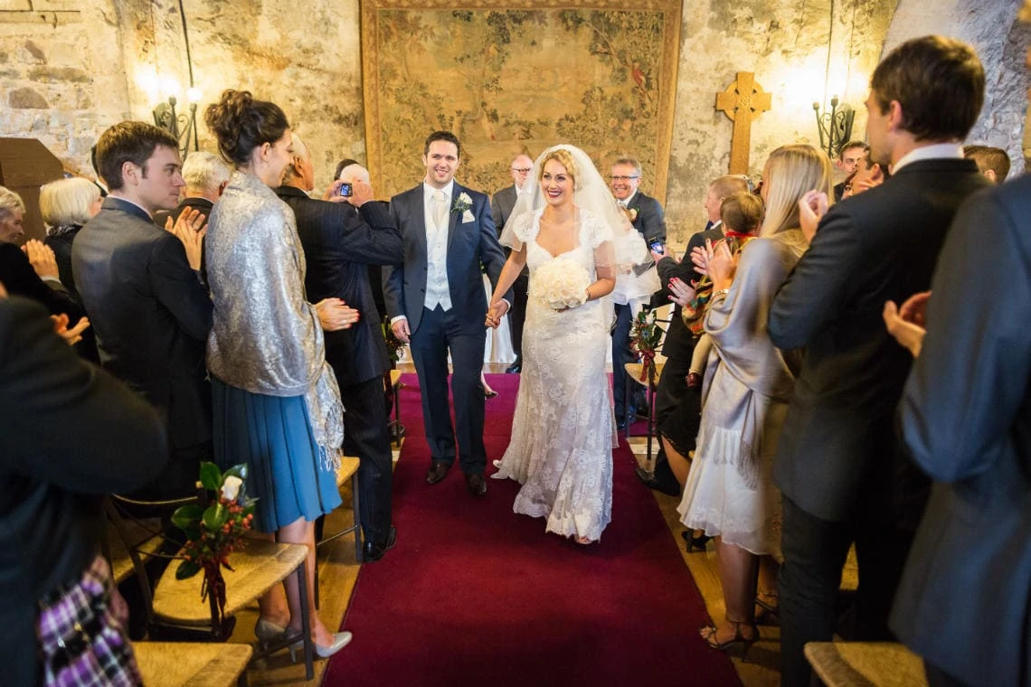 recessional as newlyweds walk up the aisle of the Auld Keep