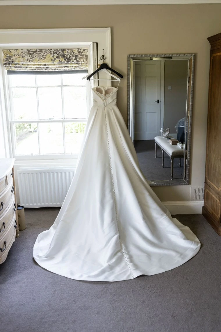 bride dress rear view on a hanger