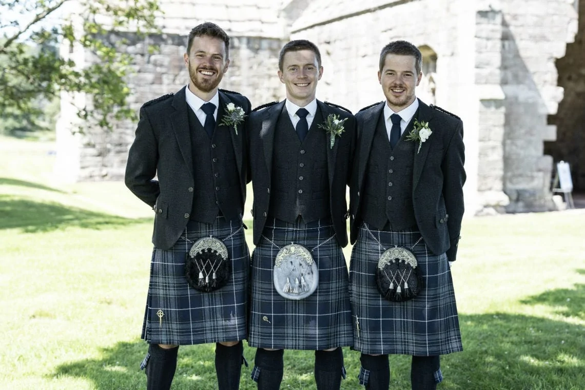 groom and best men in kilts