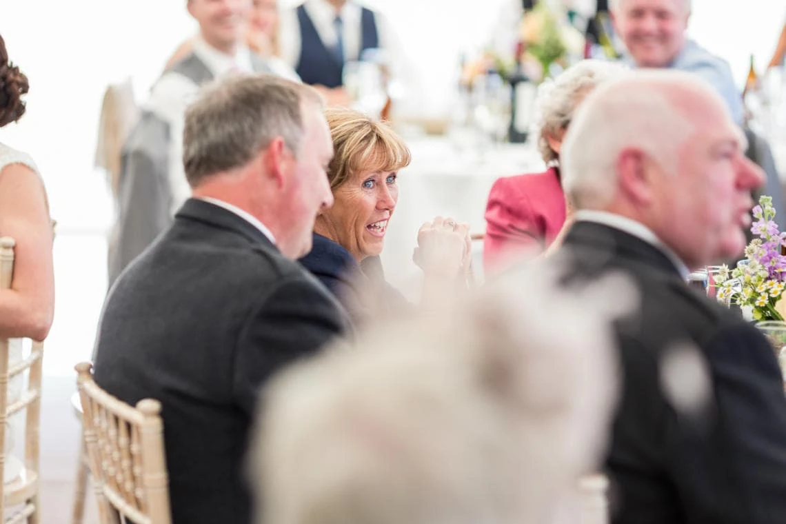 mother of the groom watches the best man speech