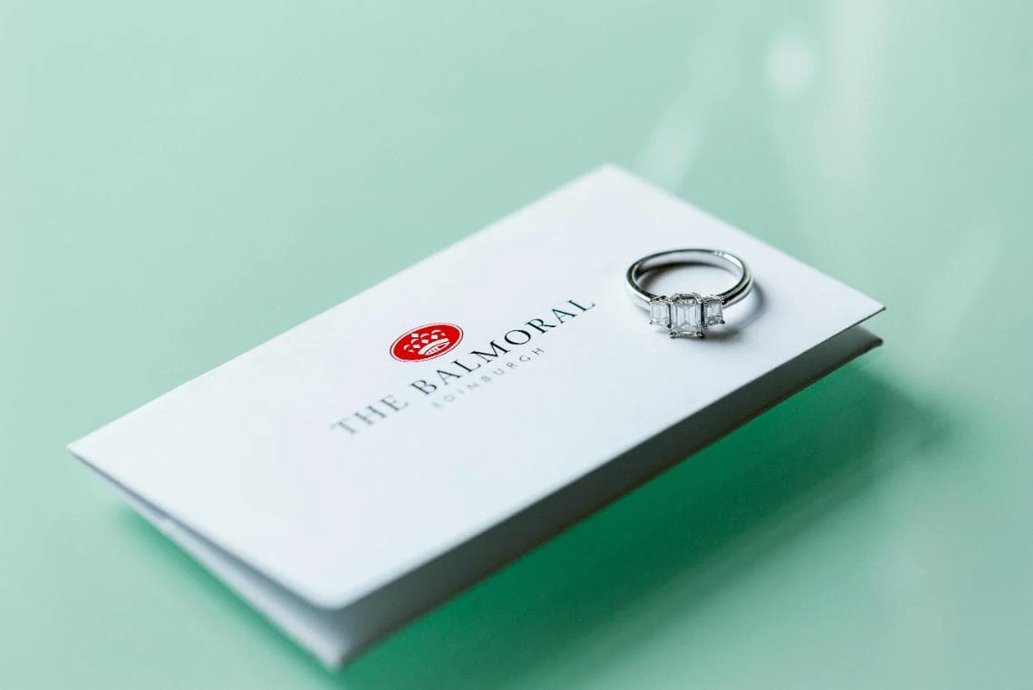 bride's engagement ring on a Balmoral Hotel business card