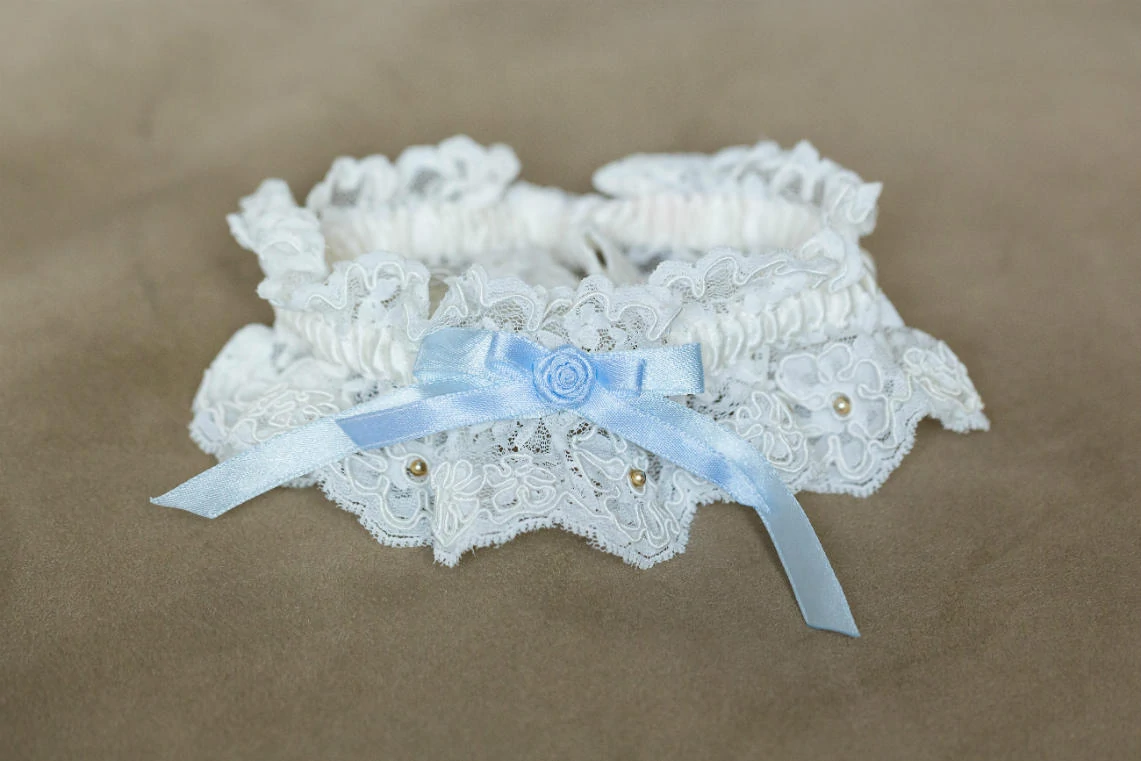 bride's garter white lace with baby blue ribbon