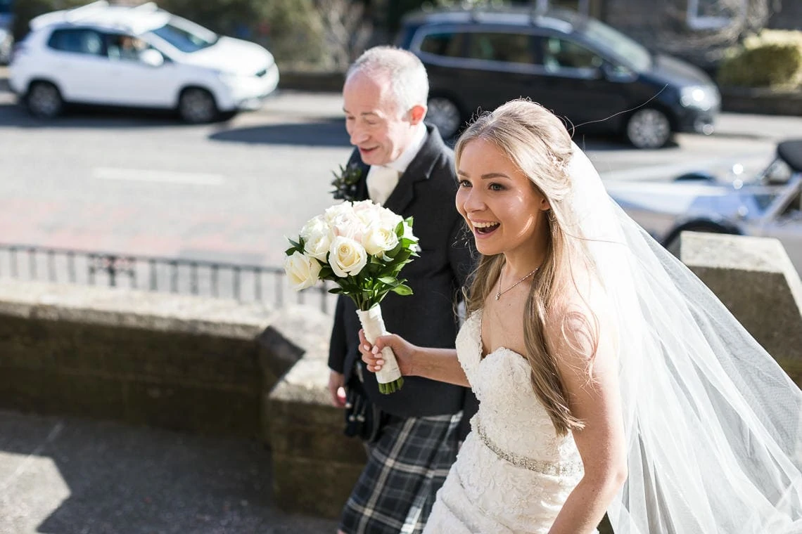 Bride Claire and dad arrive at Juniper Green Parish Church