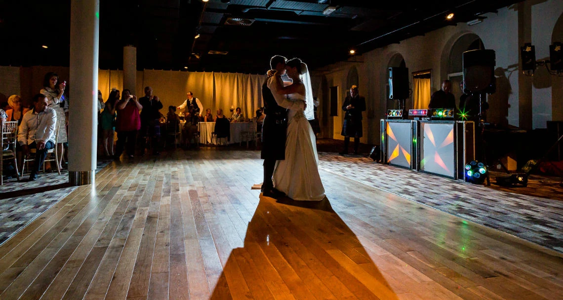 Newlyweds first dance in the evening.