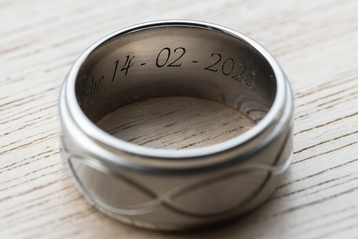 wedding date inscribed inside groom's ring