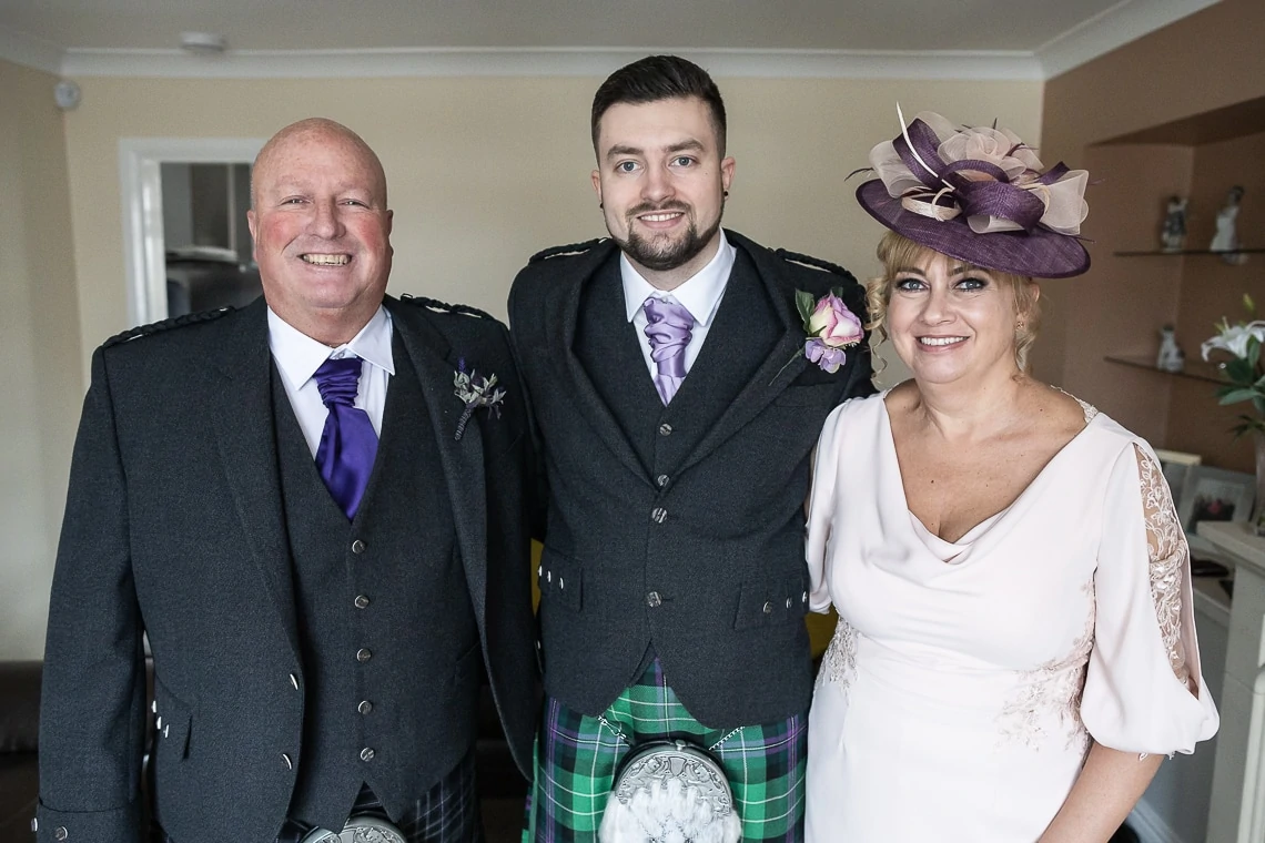 groom and his parents