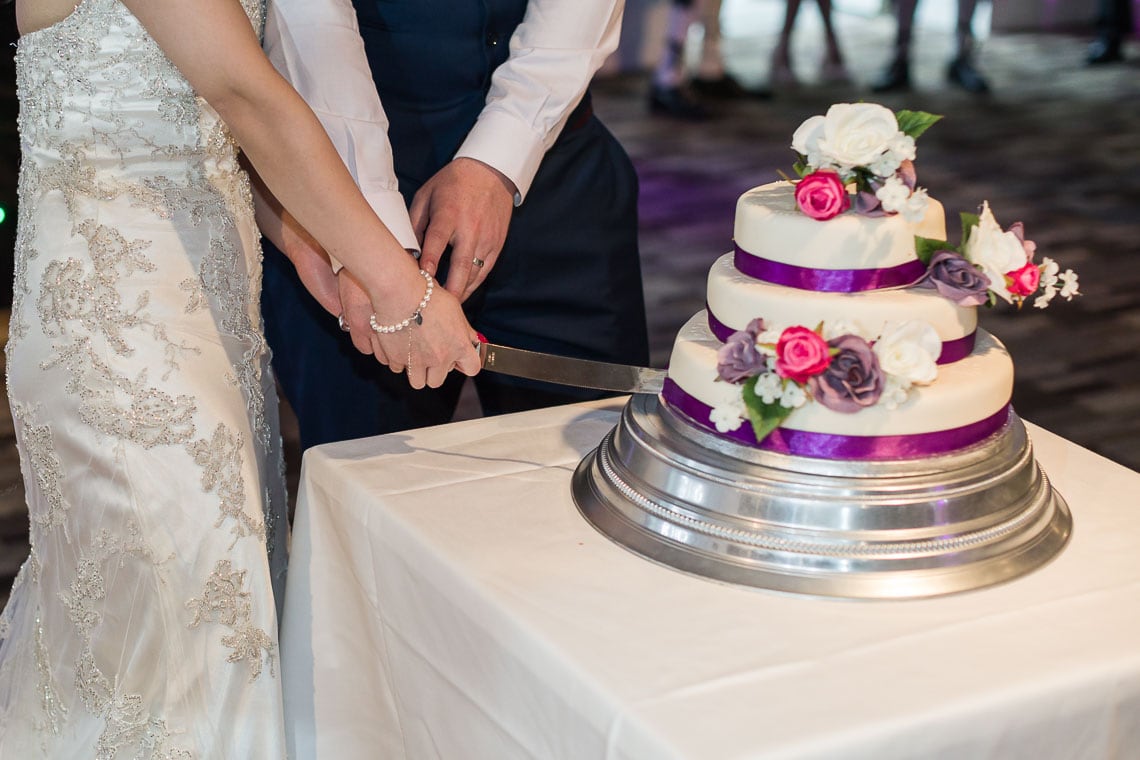Eskmills Venue Wedding bride and groom cutting wedding cake
