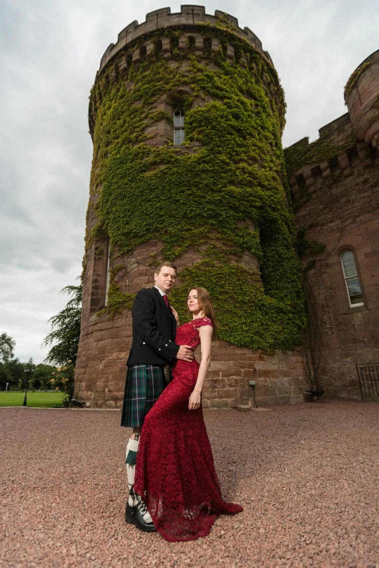 Gardens - newlyweds portrait with ivy covered turret