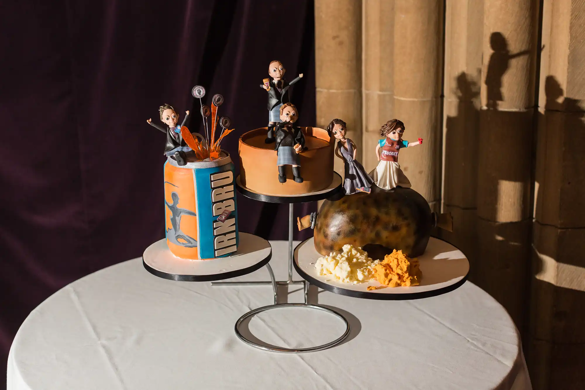 A whimsical wedding cake decorated with cake toppers representing the bride and groom as characters from "doctor who," displayed alongside a traditional guacamole-covered roasted turkey.